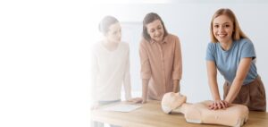 Students practicing CPR skills during a CPR Certification Chicago training class